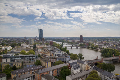 High angle view of river amidst buildings in city