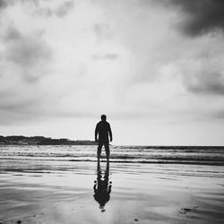 Silhouette of people on beach