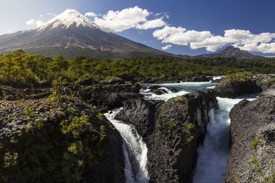 Scenic view of landscape with mountain against sky