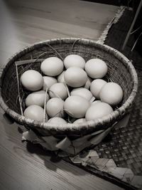 High angle view of eggs in basket