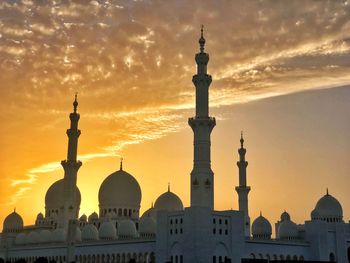 View of mosque against sky during sunset