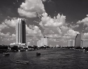 City by sea against sky