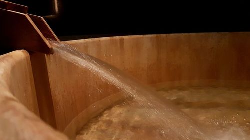 Close-up of water falling on wall