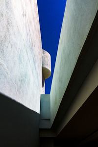 Low angle view of built structure against blue sky