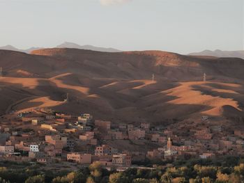 Aerial view of townscape against sky