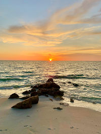 Scenic view of sea against sky during sunset