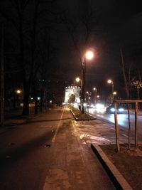 Illuminated street at night