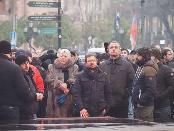 People on street in city during winter