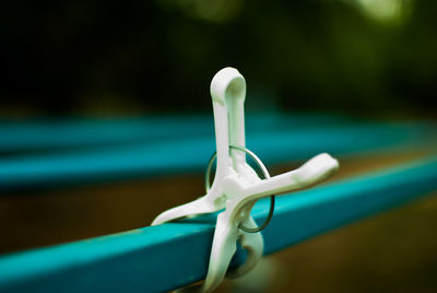 Close-up of clothespin on clothesline