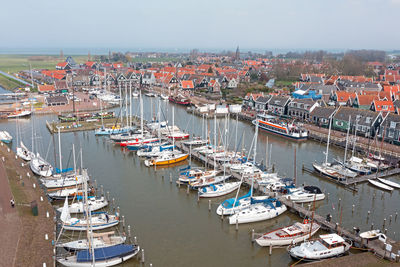 Boats moored at harbor