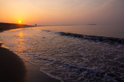 Scenic view of sea against sky during sunset