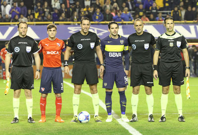 Group of people playing soccer ball