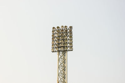 Close-up of communications tower against white background