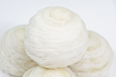 Close-up of ice cream over white background