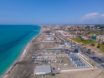 High angle view of beach against blue sky