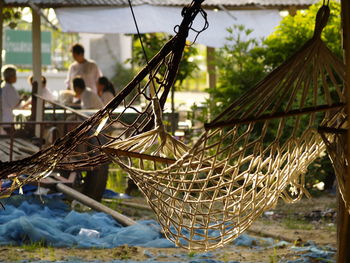 Close-up of metal hanging on table