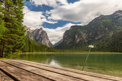 View of toblacher see, lake in the north italy, in the background the dolomites.