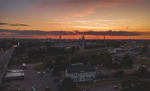 High angle view of city against sky during sunset