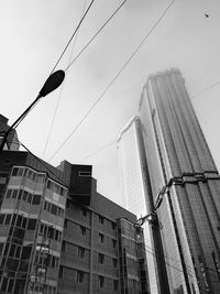 Low angle view of buildings against clear sky