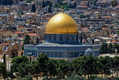 Dome of the rock and buildings in town