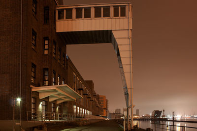 Buildings at port of hamburg against clear sky