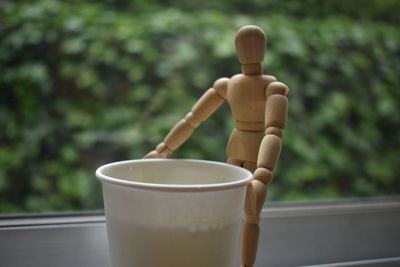 Close-up of coffee cup on table