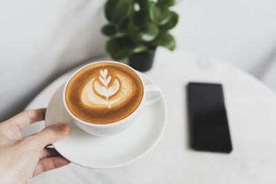 Coffee cup on table