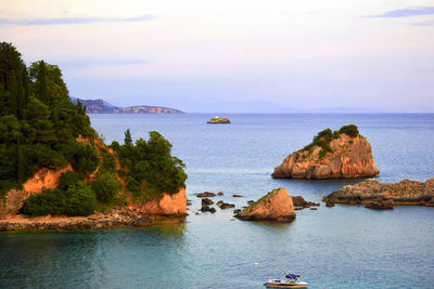 Scenic view of bay against sky