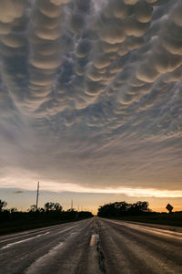 Road against sky during sunset