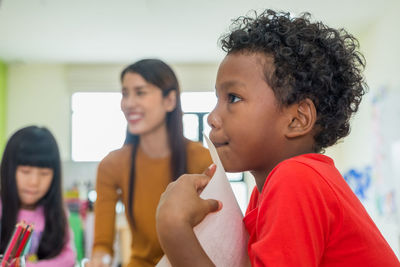 Students and teacher in kindergarten