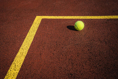 High angle view of tennis ball on field