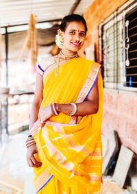 Attractive beautiful indian girl in traditional indian costume in a indian festival