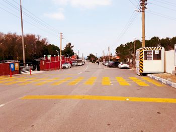 Road in city against sky