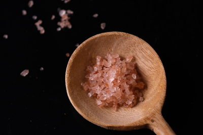 Close-up of cake against black background