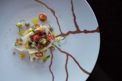 High angle view of fruits in plate on table