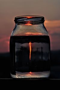 Close-up of glass jar on table