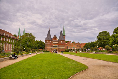 View of historic building against cloudy sky