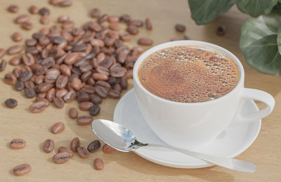 Close-up of coffee cup on table