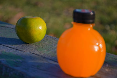 Close-up of orange fruit on table