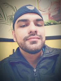 Portrait of mid adult man at home