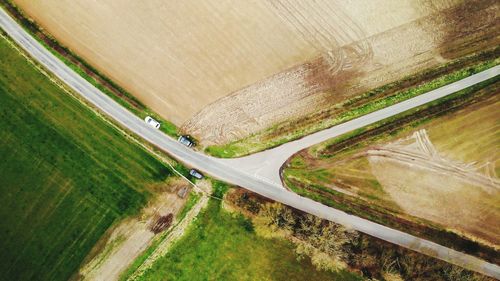 High angle view of road amidst field