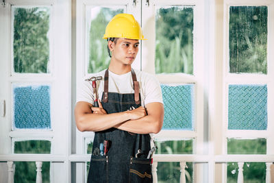 Portrait of a teenage boy wearing hat