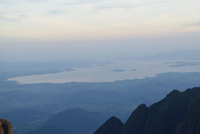 Scenic view of mountains against sky during sunset