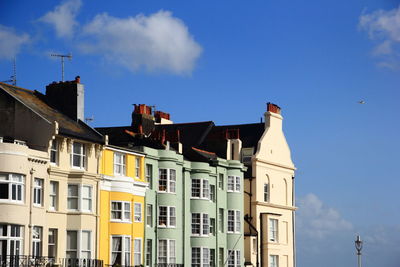 Low angle view of building against blue sky