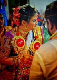 Midsection of woman dancing in traditional clothing