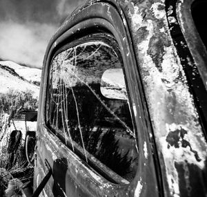 Close-up of abandoned car