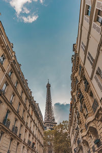 Low angle view of buildings in city against sky