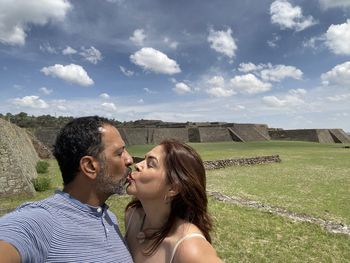 Portrait of woman and men  in a kiss