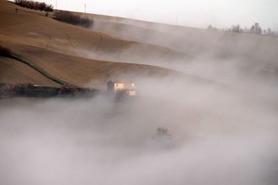 High angle view of trees on field against sky