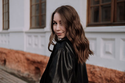 Portrait of smiling young woman